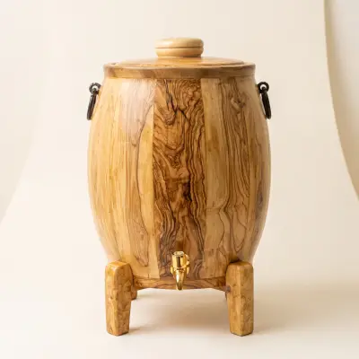 olive wood barrel-shaped oil container with tap