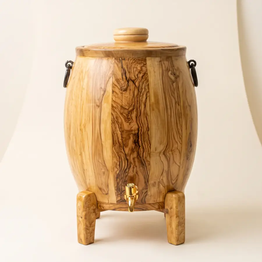 olive wood barrel-shaped oil container with tap