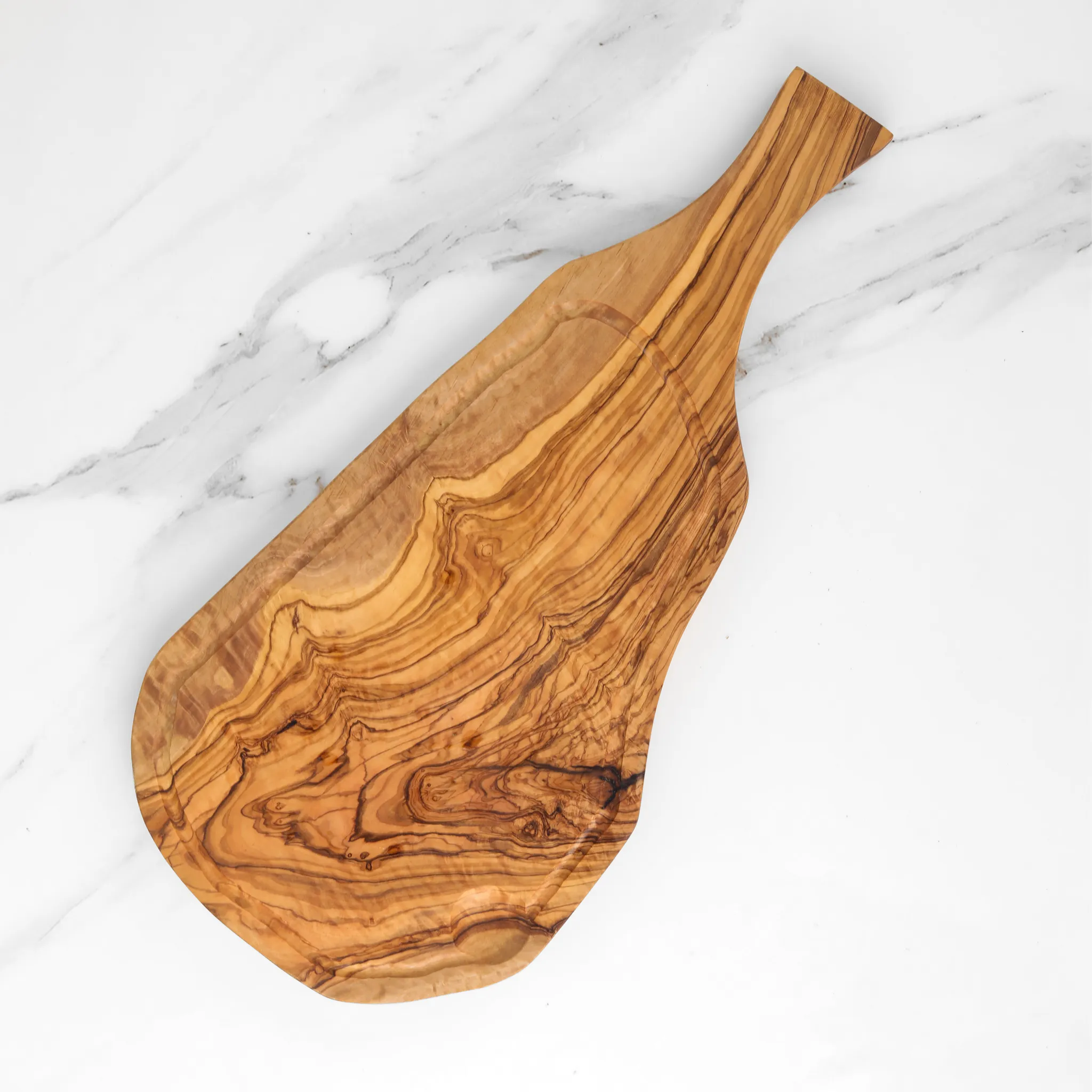 olive wood irregular shape cutting board with juice groove and handle