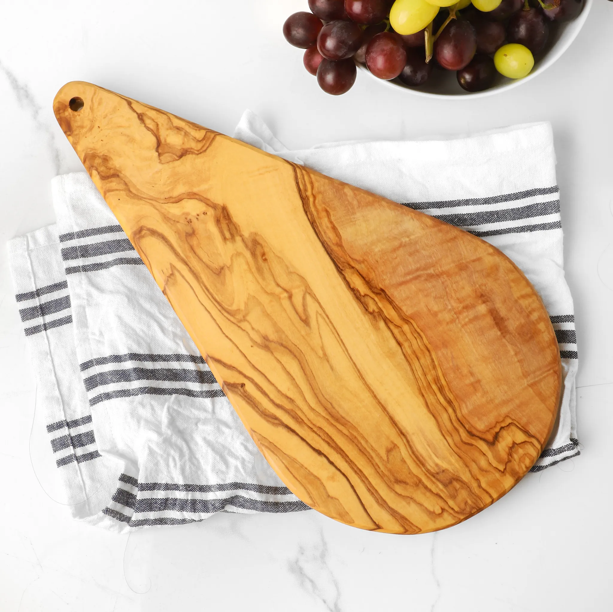 olive wood teardrop shape cutting board