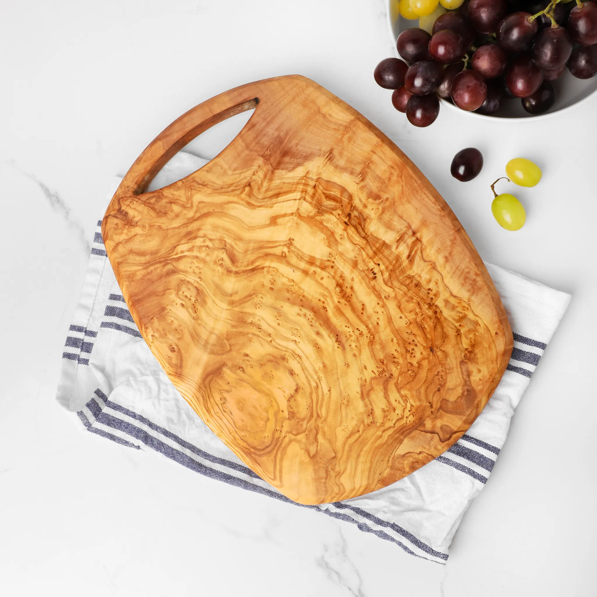 olive wood cutting board with handle