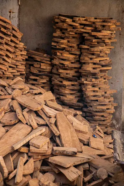 Olive wood planks stacked for air drying