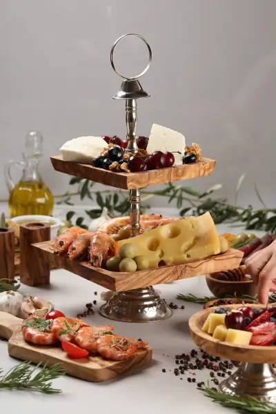 Olive wood serving boards in restaurant table service