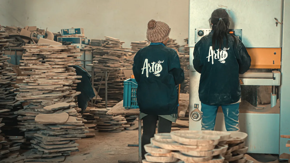 ArtisRaw artisans at work in the olive wood workshop